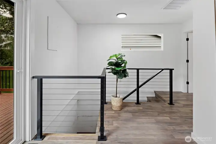 Stairwell to downstairs flex/rec room Stairwell to downstairs flex/rec room