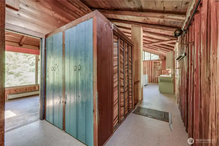Hallway facing one bedoom and kitchen/main entrance