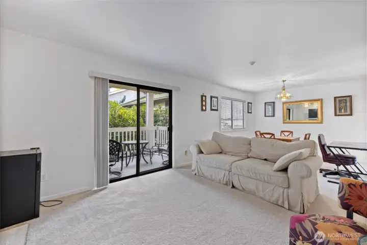The living room features a sliding glass door that opens to your private balcony. The living room features a sliding glass door that opens to your private balcony.
