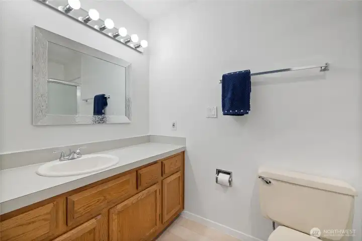 Primary bathroom with generous vanity and counter space. Primary bathroom with generous vanity and counter space.