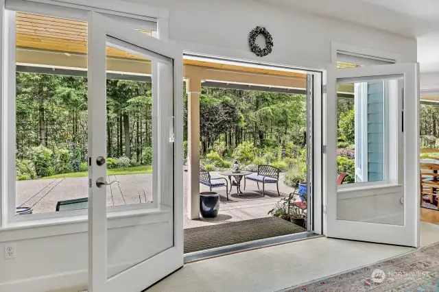 Double doors open to grand outdoor livingspace