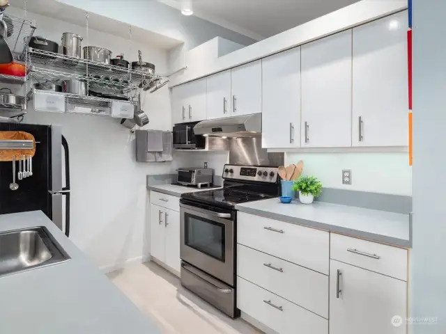 The owner loves to cook so added lots of extra storage in the kitchen as well as a pantry area in the wall of closets across from the kitchen.