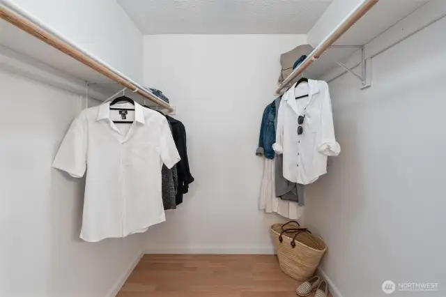 Primary bedroom walk-in closet