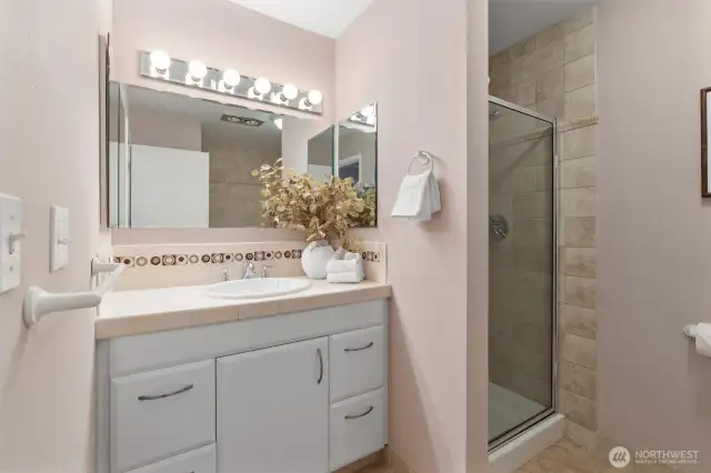 Full bath upstairs has a separate shower and tub.