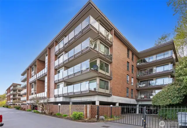 Harbor Park has been updated with glass deck-railing to maximize the views! The covered parking space and storage for our unit is just past this gate.