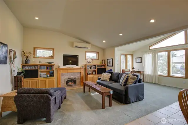 Living room with a propane fireplace.