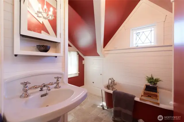 The upstairs shared bath has a soothing old world feel and a coziness you're going to love.