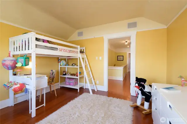 At the far end of the hall, you find bedroom No 2. Natural light, generous storage and richly warm clear fir floors are themes that carry through the upstairs.