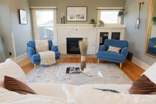Through the front door you're welcomed into the spacious, sunny living room.