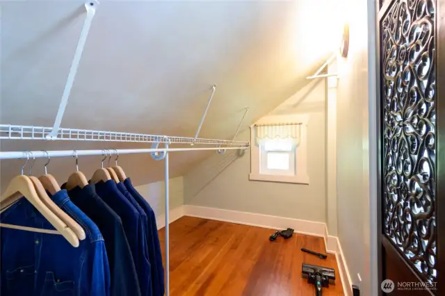 The Main Bed walk-in-closet offers enormous potential to expand with a custom closet system. Adding built-ins and more hanging space would make better use of this blank canvas.