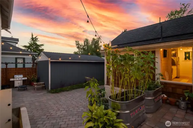 The courtyard, Cottage and 1-car garage with alley access.