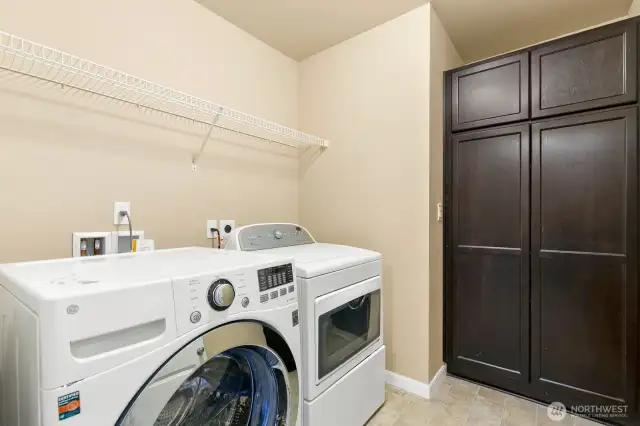 Laundry space on upper level offers more storage!