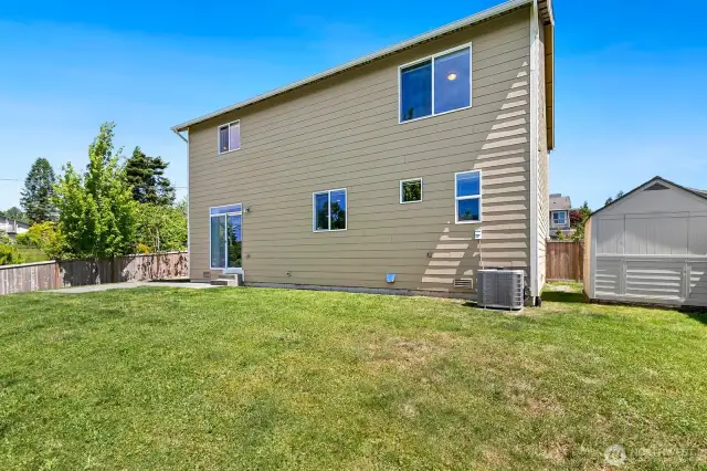 Great storage shed on side yard, stays with property.