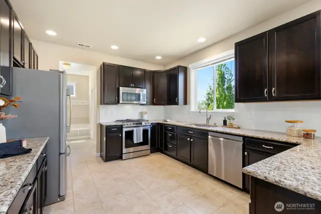 Look at all the counter space! Pantry & Mud room space in room beyond kitchen.