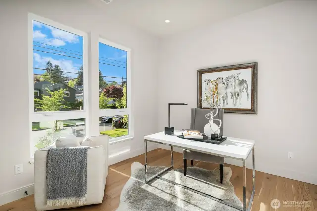 Imagine working in this bright, sun-drenched office, bathed in natural light throughout the day. Perfectly located at the front of the home and above the street.  This space offers the ideal vantage point to keep an eye on the comings and goings outside, all while enjoying a peaceful, productive environment.