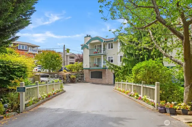 Secure gated garage entrance. 2 side by side parking spaces assigned to the unit