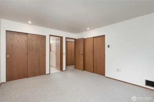 Welcome to the primary with dual closets.