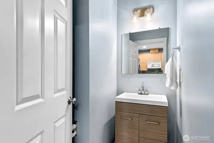Main-level powder room off kitchen