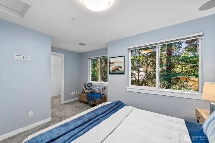 Bright bedrooms with large windows and walk in closet