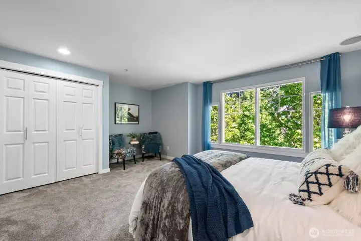 Spacious primary suite with abundant natural light