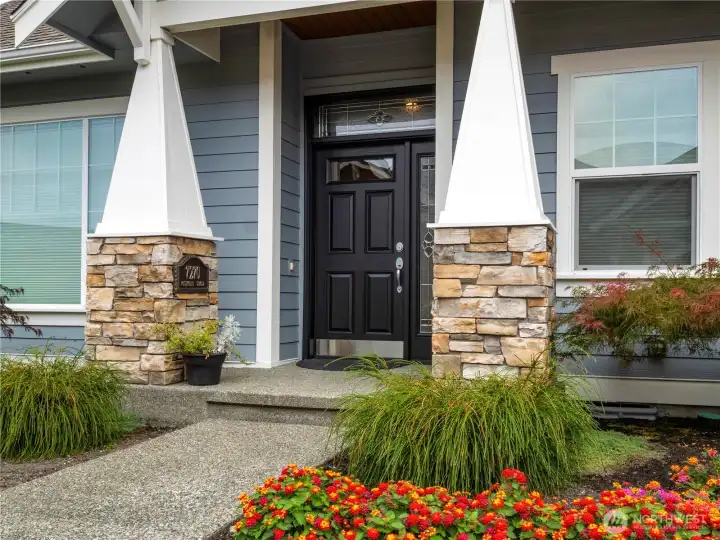 The craftsman style rambler is set up for comfortable living in a lovely neighborhood.