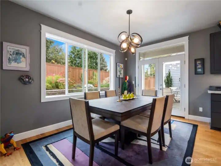 Dine with a view of the back yard and patio.