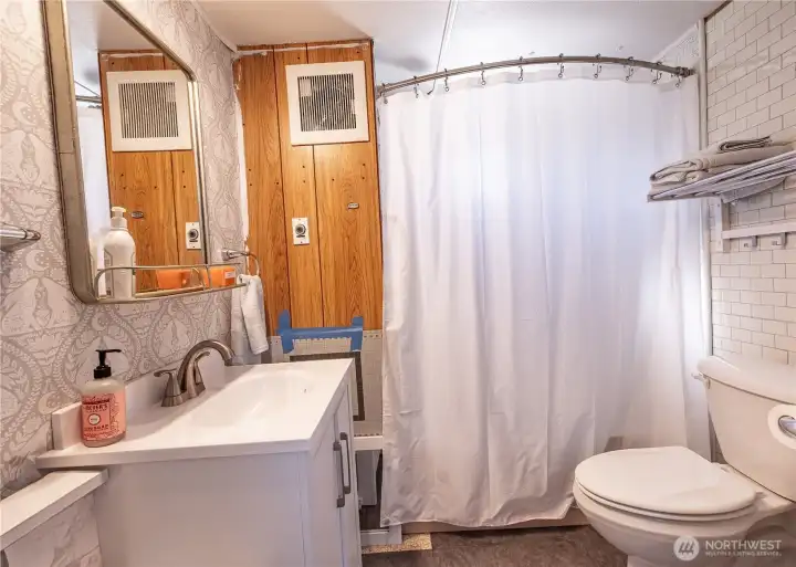 Bathroom and laundry area that needs finishing touches