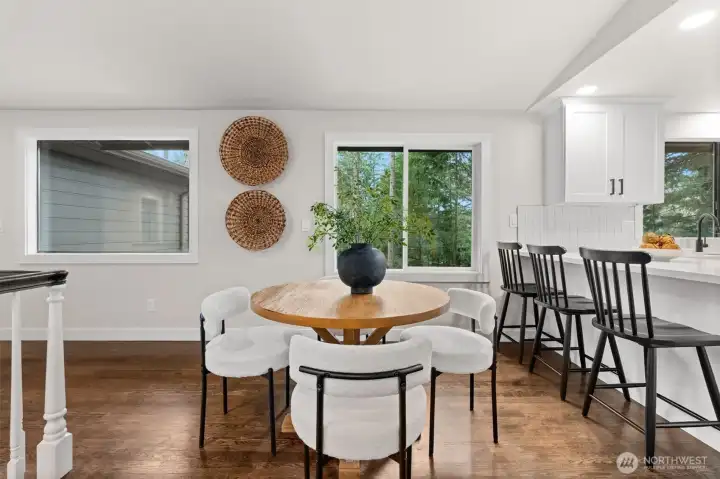 Dining area conveniently located near kitchen, living room, and bathroom.