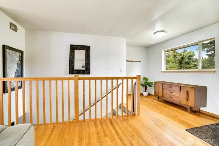 Let the stylish hardwoods lead the way downstairs!