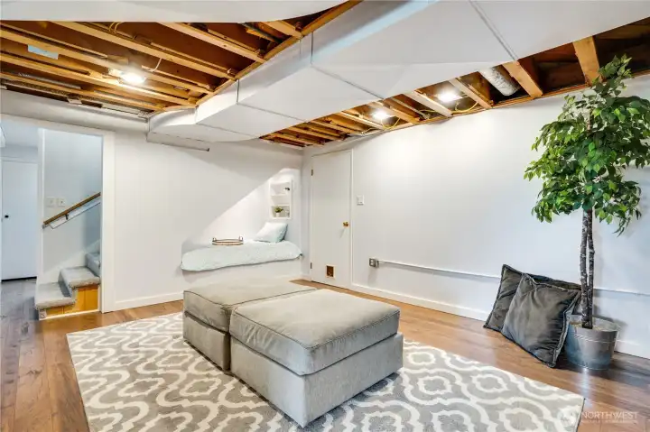 This lower level family room is made for game nights, binge sessions, and memory-making moments. Cozy up with a book on slower days.