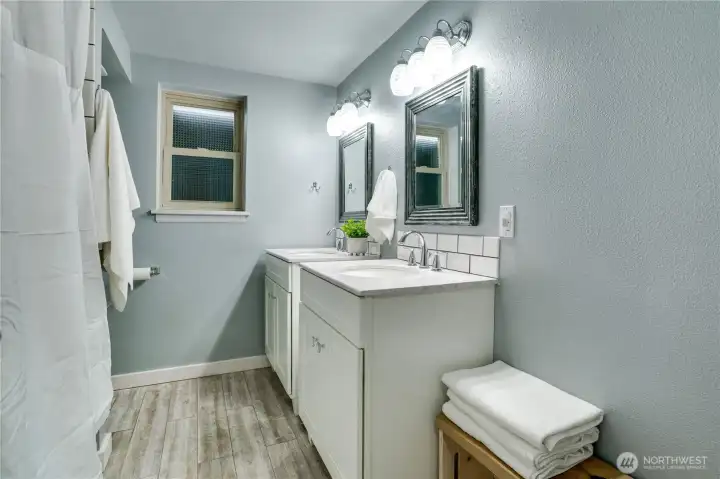 Fully updated in 2017, this full bathroom refresh included two new vanities, modern lighting and luxury vinyl plank flooring. Get your own at-home spa experience!