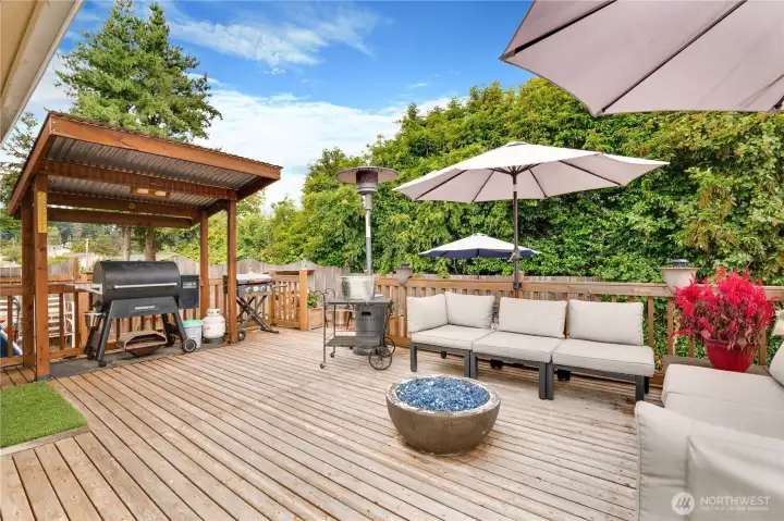 From impromptu cookouts to sunset chats, this spacious deck is an extension of your main living space, complete with a covered BBQ zone built for everyday joy.