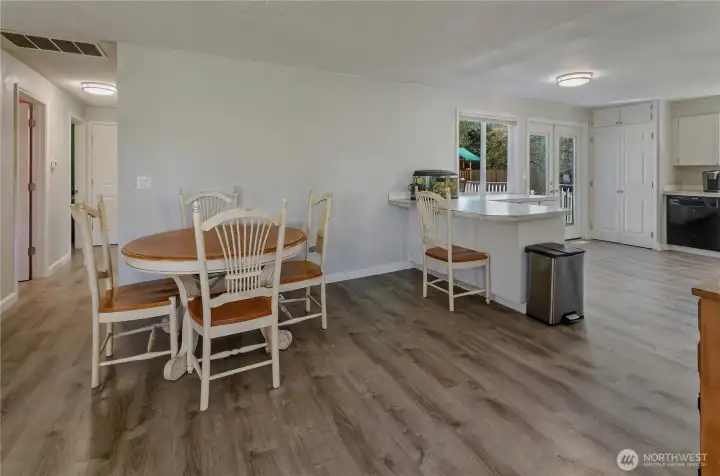 Peninsula in Kitchen seats 3 easily and provide addition countertop and storage.