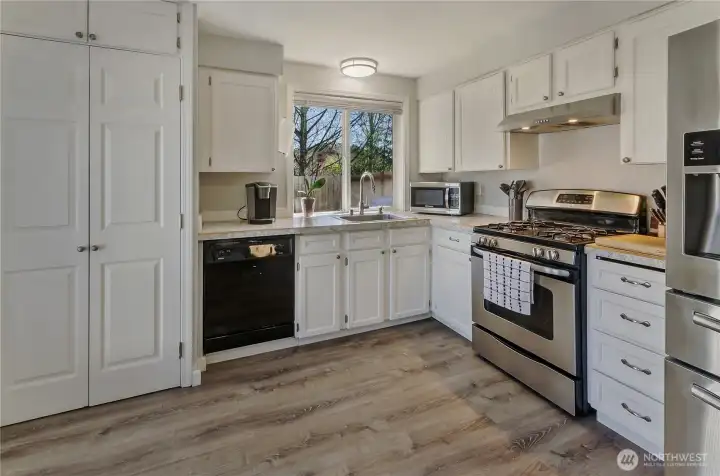 More natural light for the kitchen through South-facing kitchen sink half vent window.