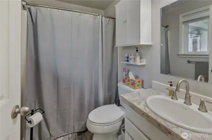 Primary Bath is a full-bathroom with tub and shower.