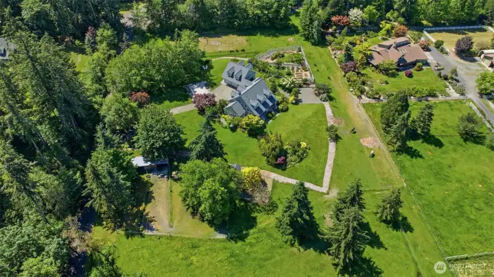 5 lush acres fully fenced for farm and garden.