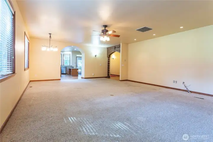 Living room facing entrance/kitchen