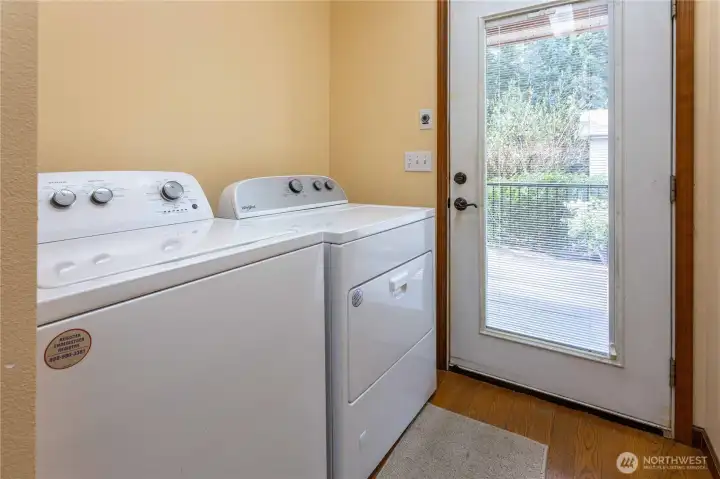 Laundry room with a shower/mudroom and front deck access