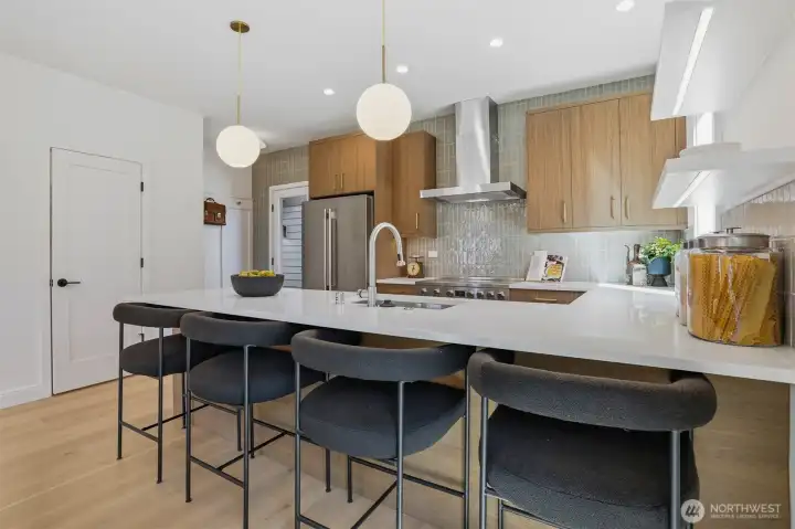 Large kitchen with breakfast bar.