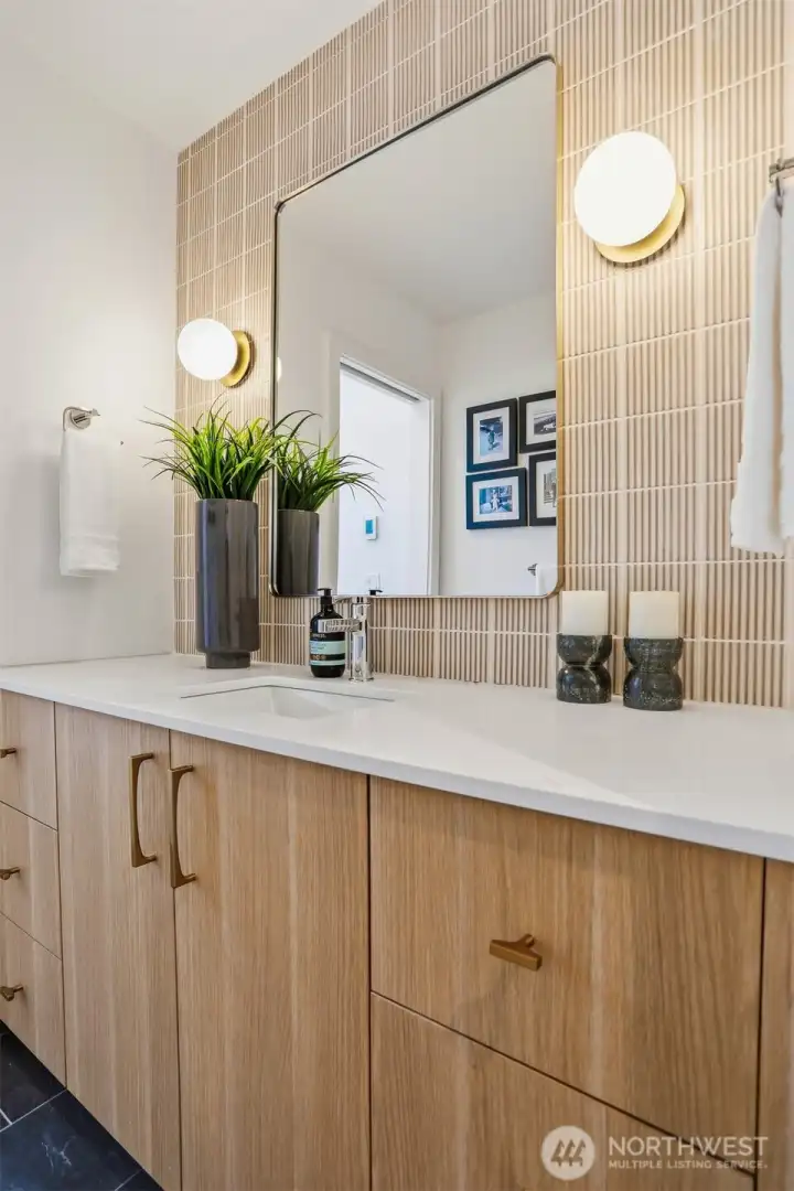 Shared full bath with double sink vanity