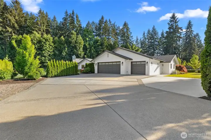 Three Car Garage and Extra Space for Parking.