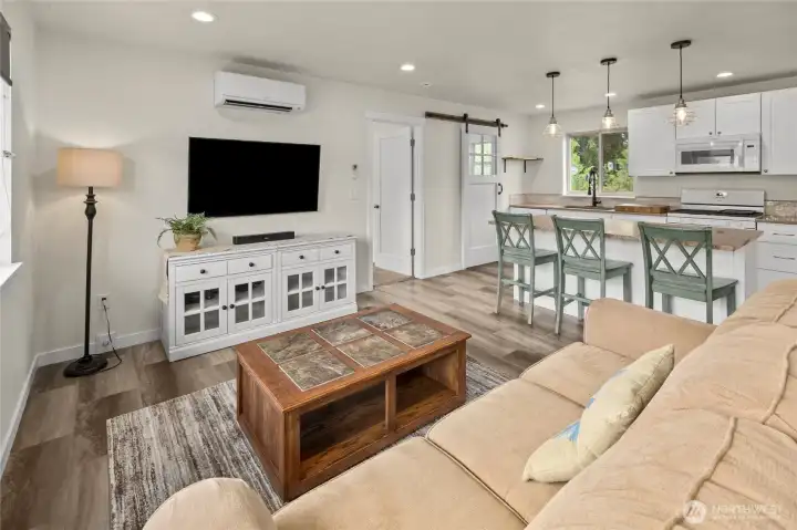 Nice plank flooring in great room and throughout the main living space. Mini-split heat pump heats and cools the spaces. There is also a gas stub to in future put in a gas stove! Nice plank flooring in great room and throughout the main living space. Mini-split heat pump heats and cools the spaces. There is also a gas stub to in future put in a gas stove!