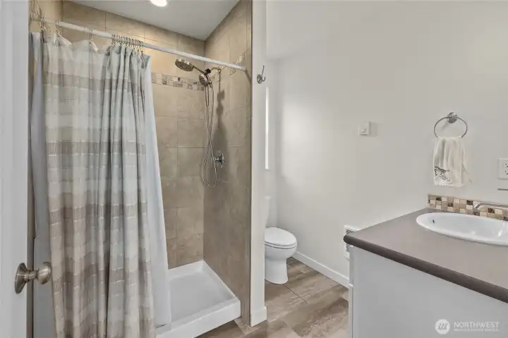 Hallway 3/4 bath with tile surround shower Hallway 3/4 bath with tile surround shower