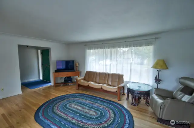 Family room that is open to dining area.