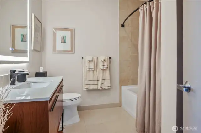 Beautifully appointed bathroom for the second sleeping space.