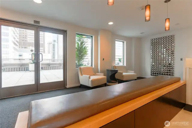 The rooftop is designated for the exculsive use of Madison Tower residents, and includes this indoor lounge ...