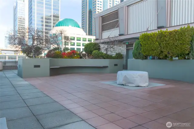 ... as well as outdoor spaces, including a cooking area.