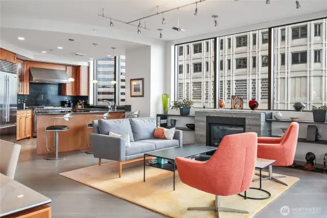 Another view of the great room, with spacious dining area and luxurious kitchen.