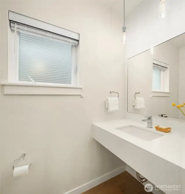 The 1/2 bath is available for guests on the main level.