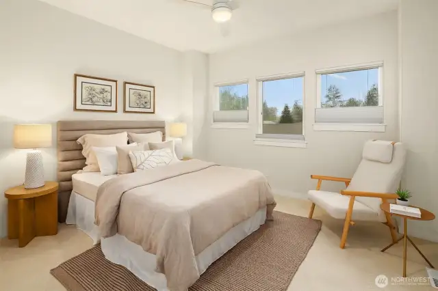 A sweet and romantic primary bedroom. Custom top-down-bottom-up shades allow for privacy.